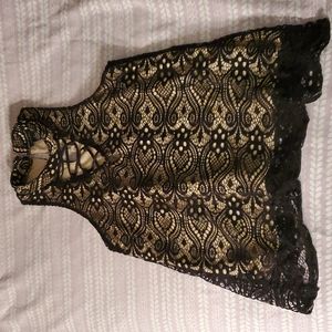 Black lace top. Lace up front, high neck. Rue 21, like new!